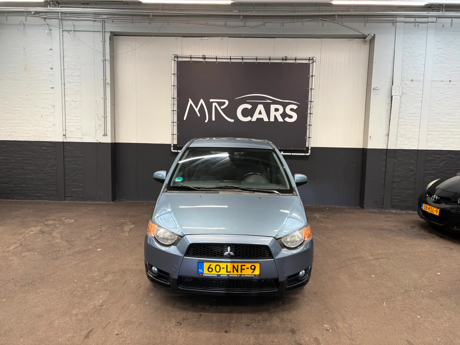 Mitsubishi Colt (2010) — foto 1