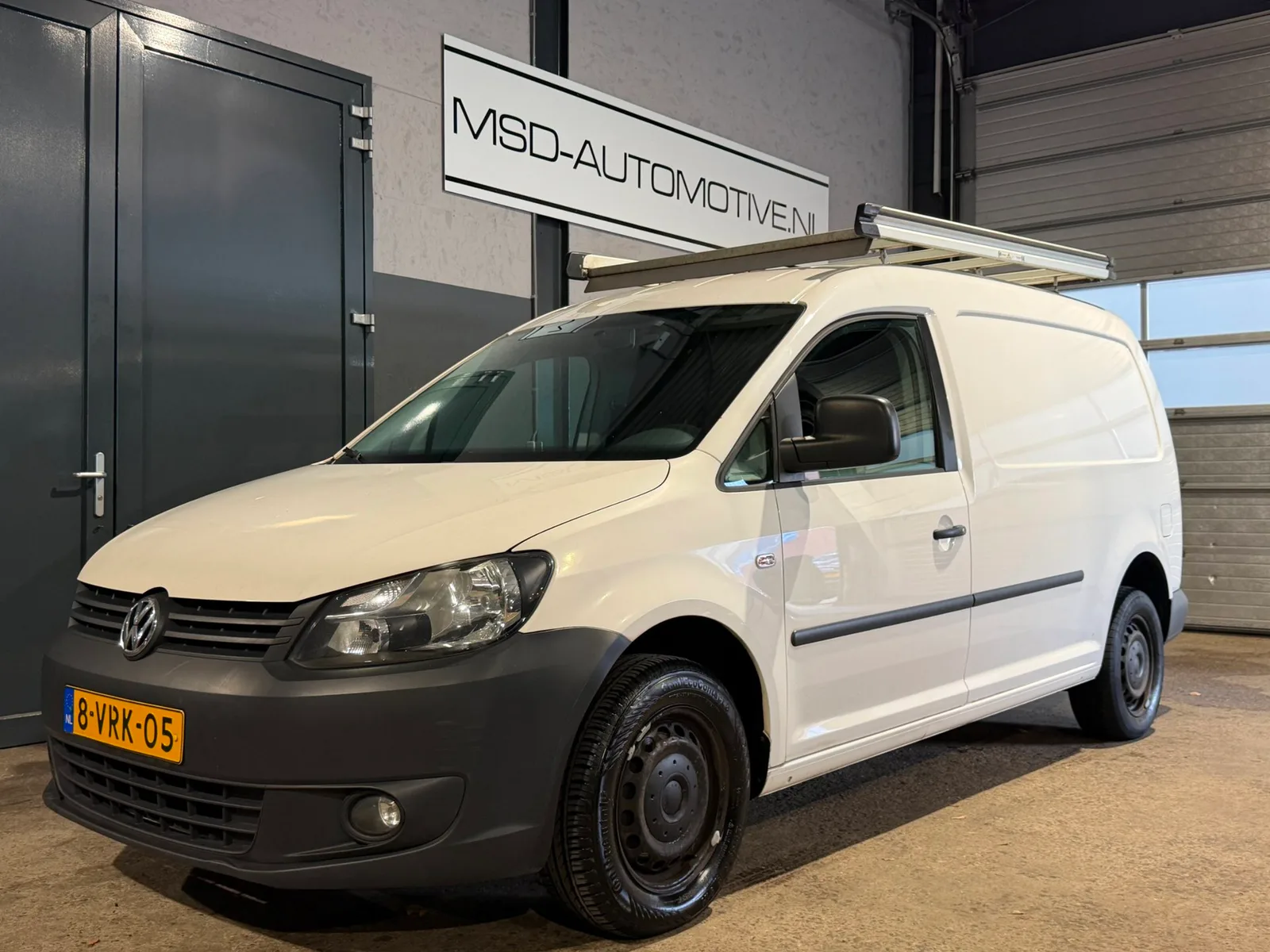 Volkswagen Caddy (2011) — foto 1