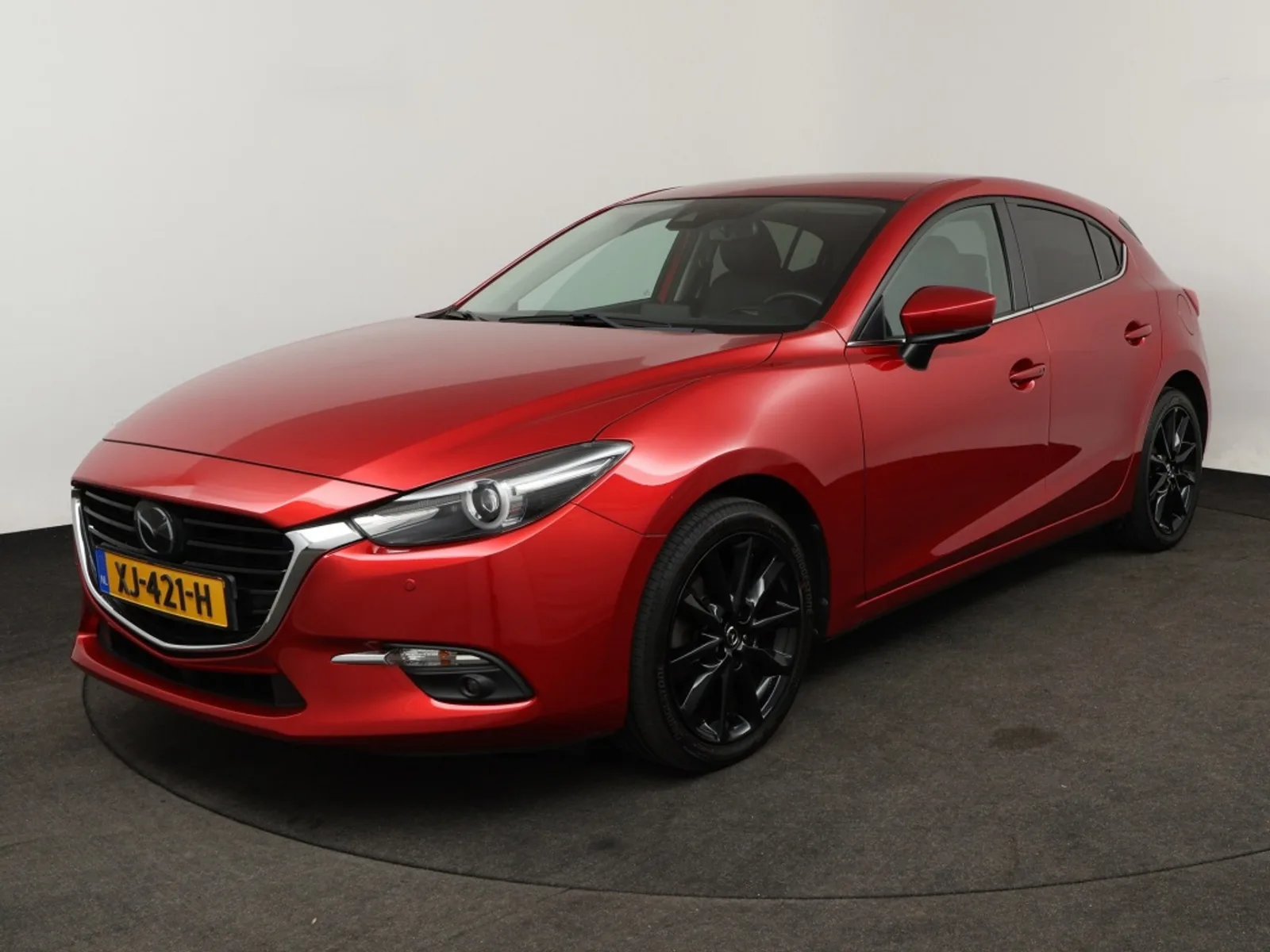 Mazda 3 (2019) — foto 1