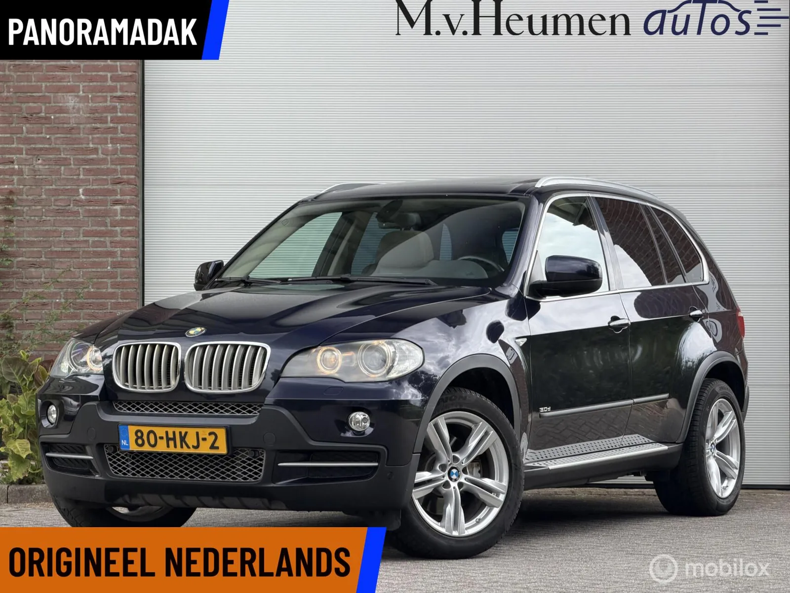 BMW X5 (2009) — foto 1