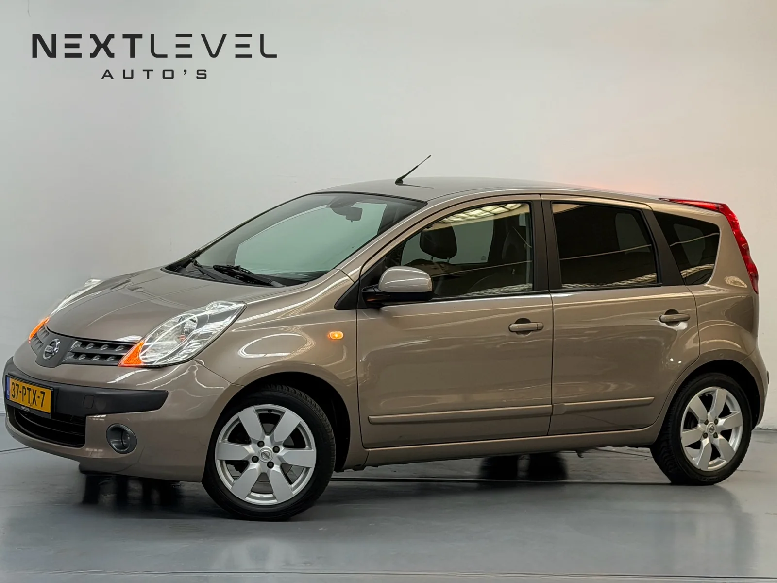 Nissan Note (2006) — foto 1