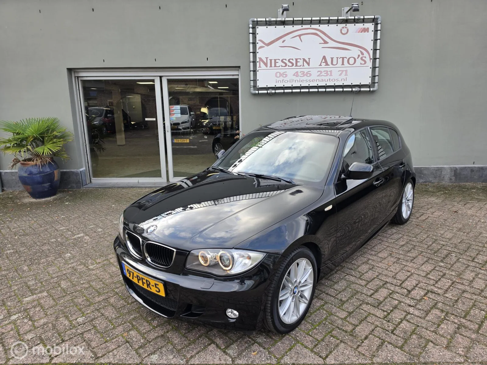 BMW 1-Serie (2011) — foto 1