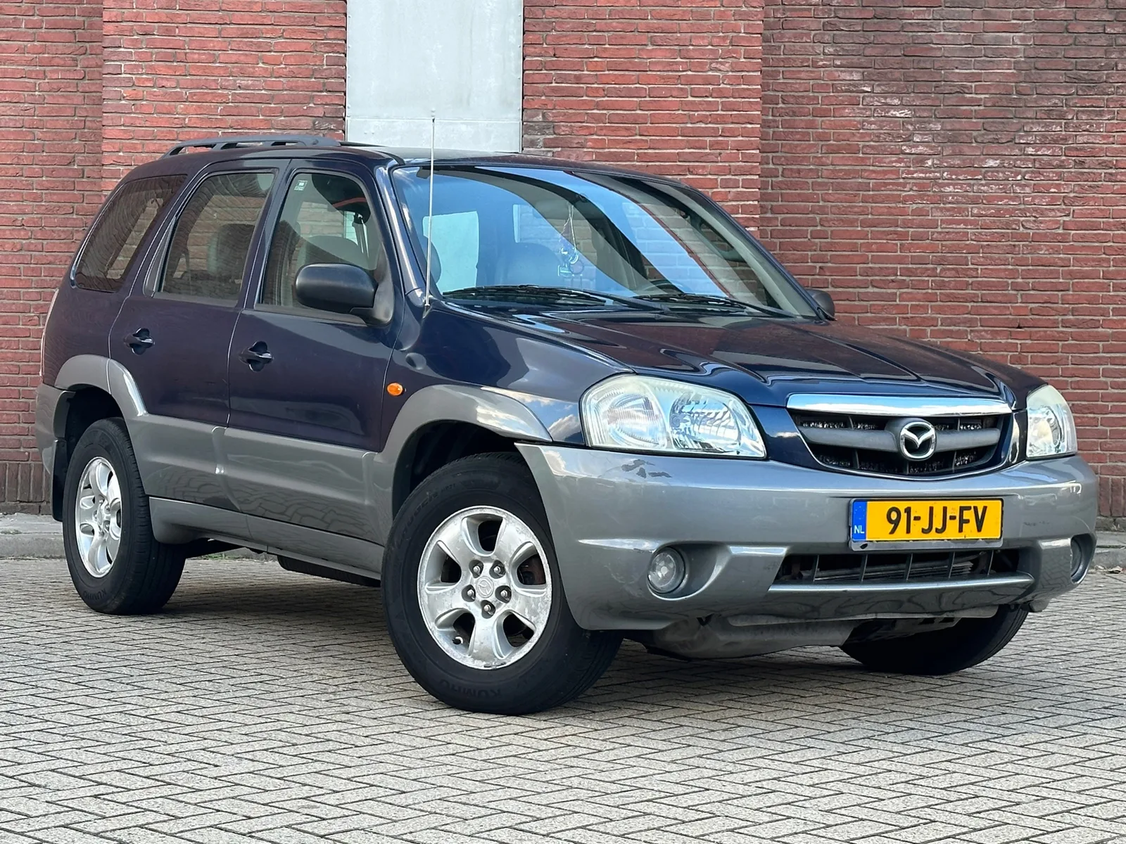 Mazda Tribute (2002) — foto 1