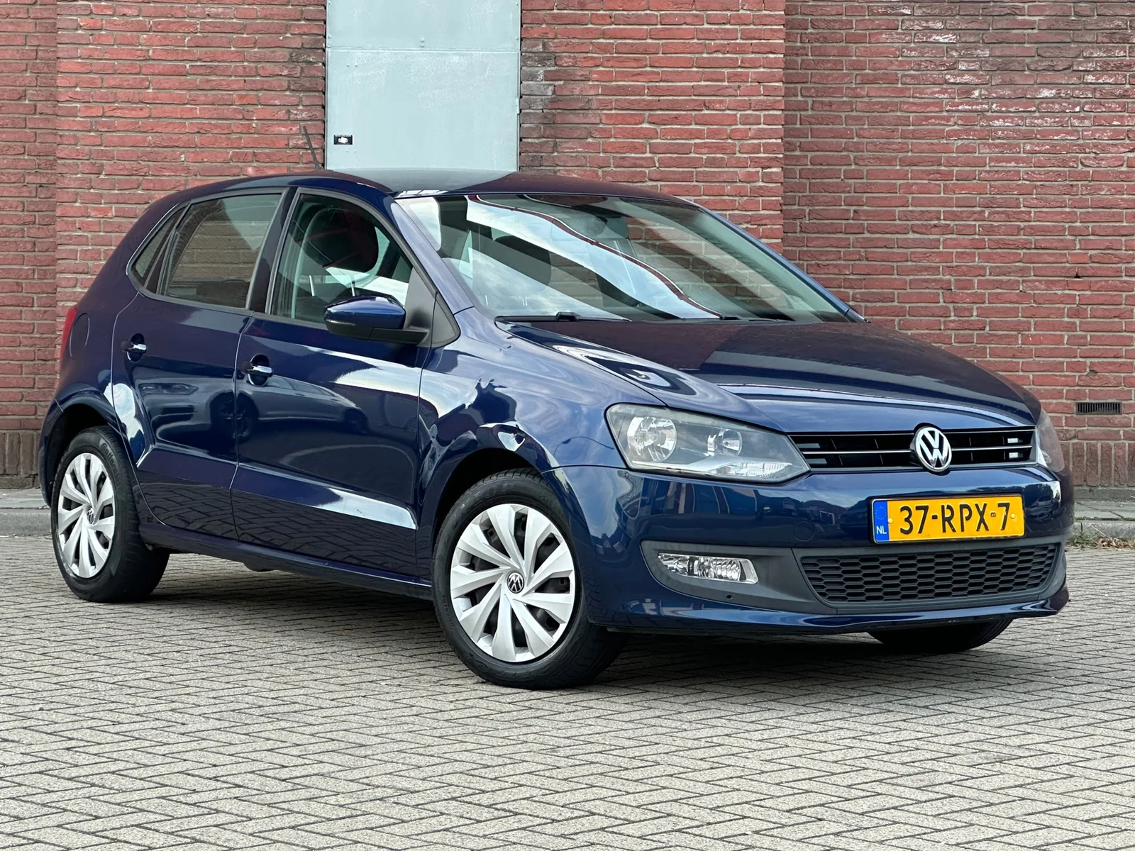 Volkswagen Polo (2011) — foto 1