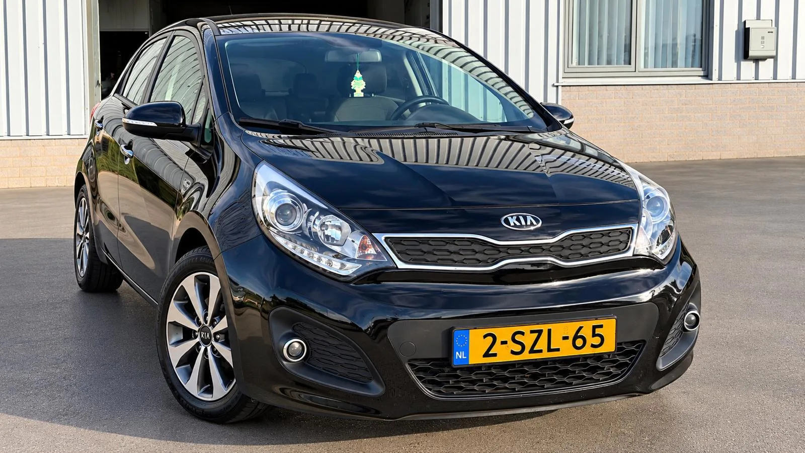 Kia Rio (2014) — foto 1