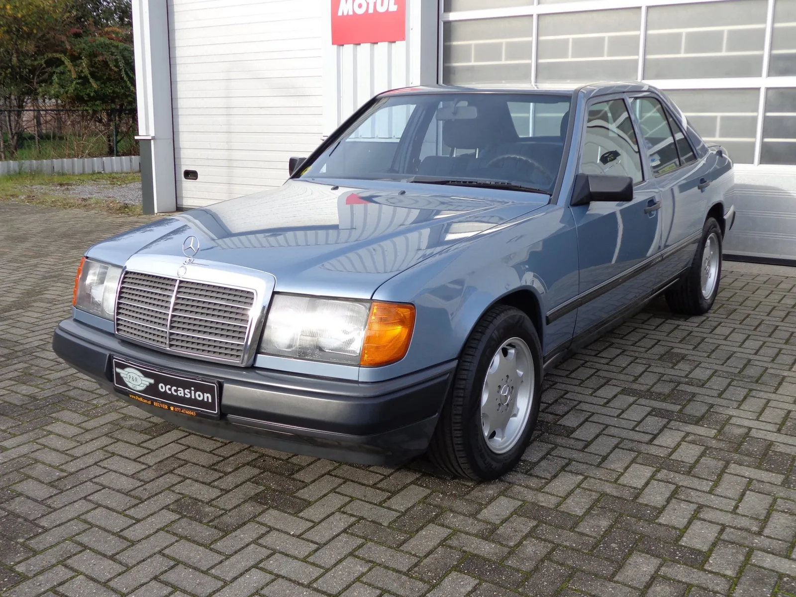 Mercedes-Benz 200-Serie (1985) — foto 1