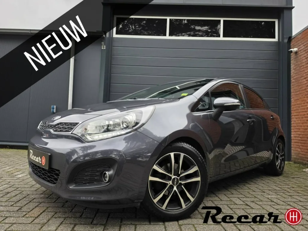 Kia Rio (2014) — foto 1