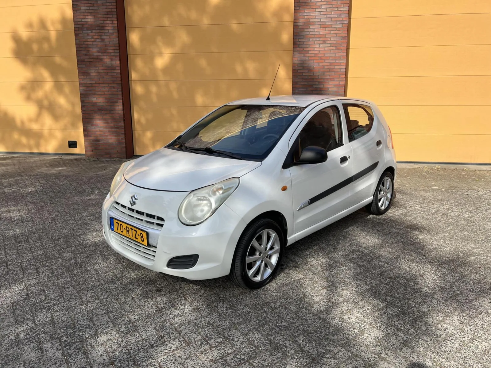 Suzuki Alto (2011) — foto 1