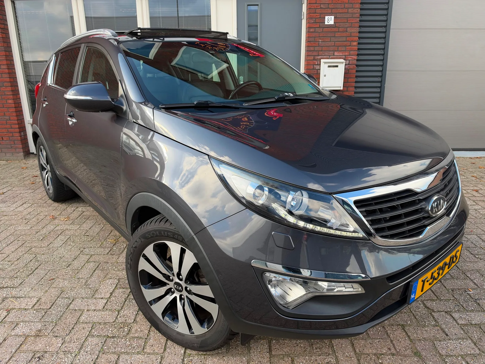 Kia Sportage (2011) — foto 1