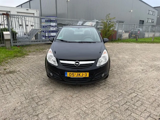 Opel Corsa (2009) — foto 1