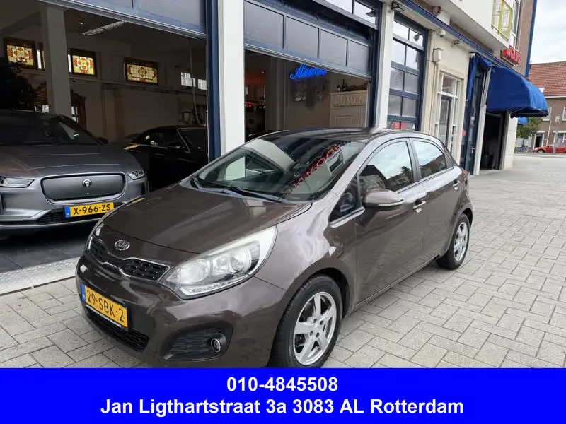 Kia Rio (2011) — foto 1