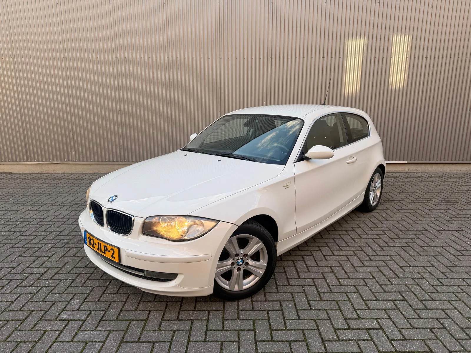 BMW 1-Serie (2009) — foto 1