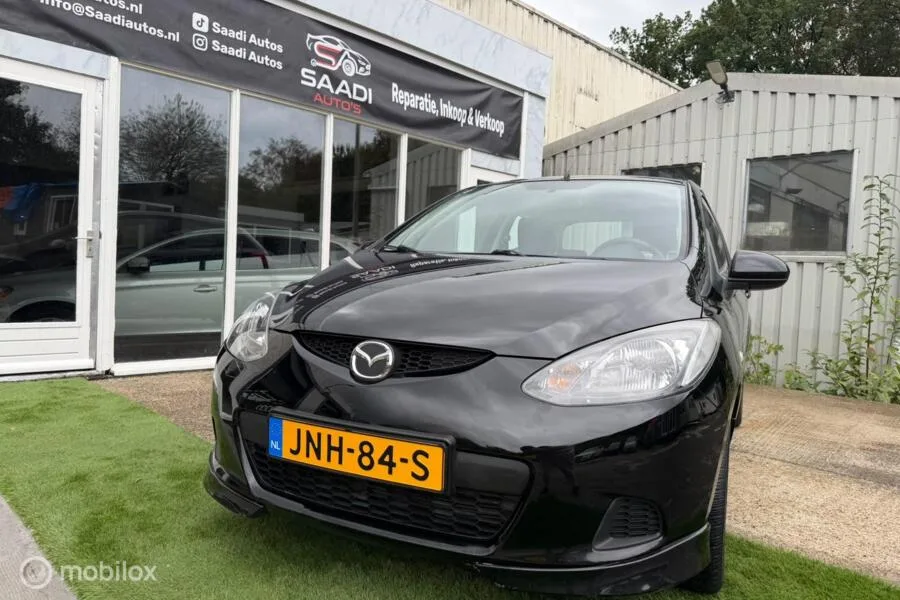 Mazda 2 (2009) — foto 1