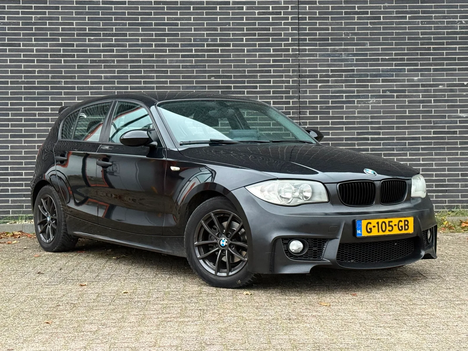BMW 1-Serie (2006) — foto 1