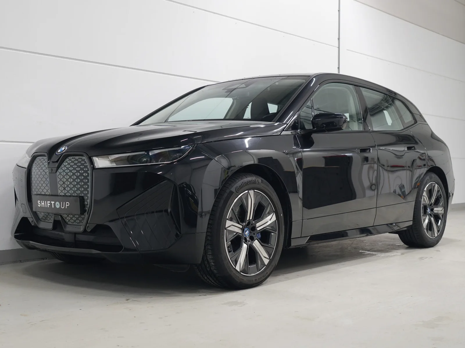 BMW iX (2024) — foto 1