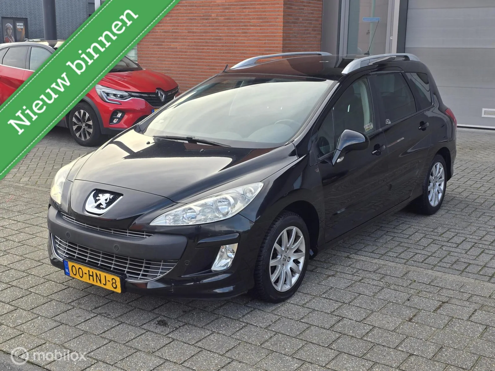 Peugeot 308 (2009) — foto 1