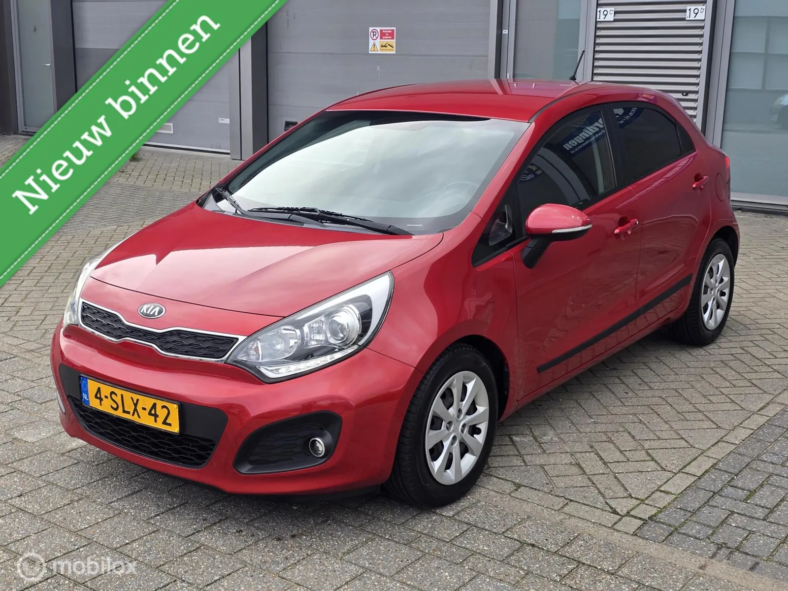 Kia Rio (2013) — foto 1
