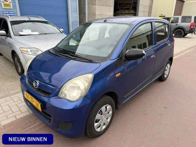 Daihatsu Cuore (2008) — foto 1