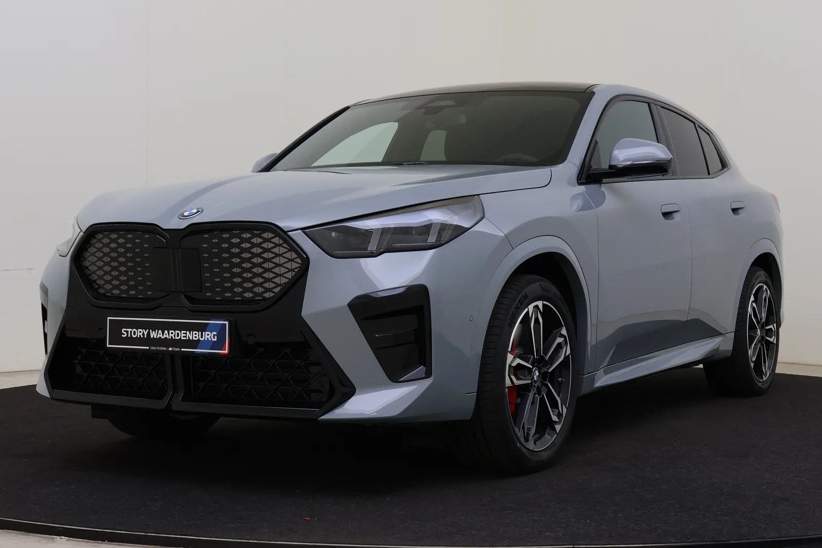 BMW iX2 (2026) — foto 1