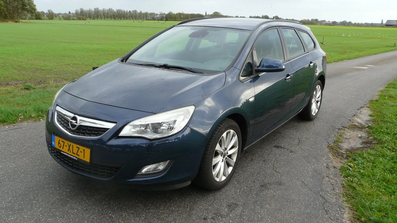 Opel Astra (2012) — foto 1
