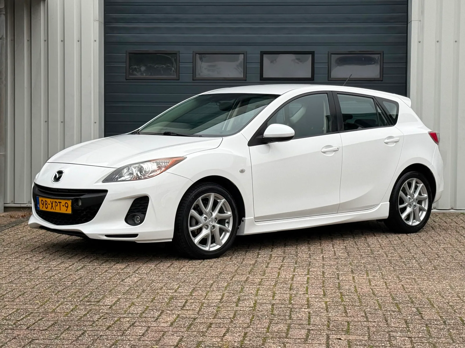 Mazda 3 (2012) — foto 1