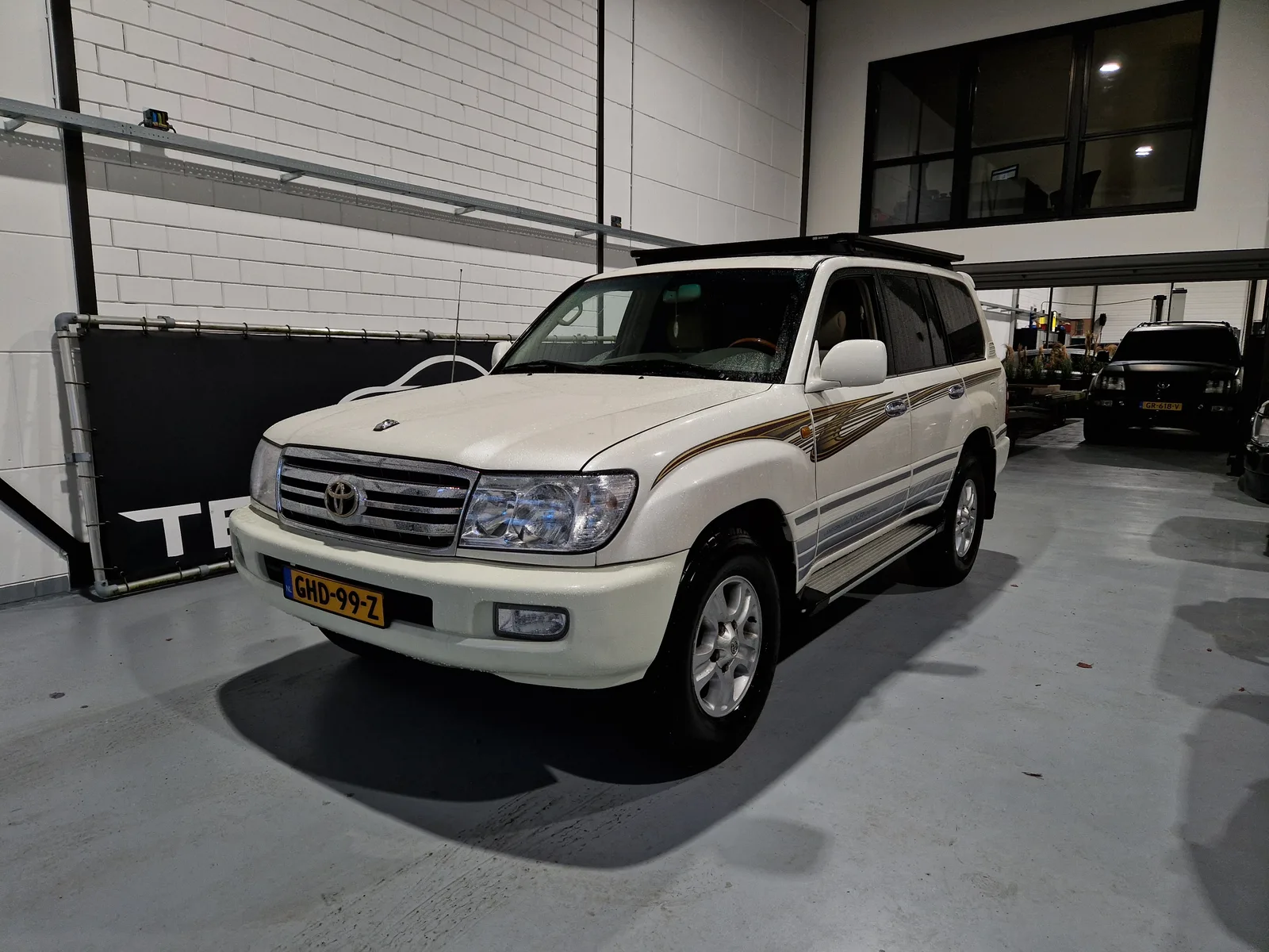 Toyota Land Cruiser 100 (2003) — foto 1
