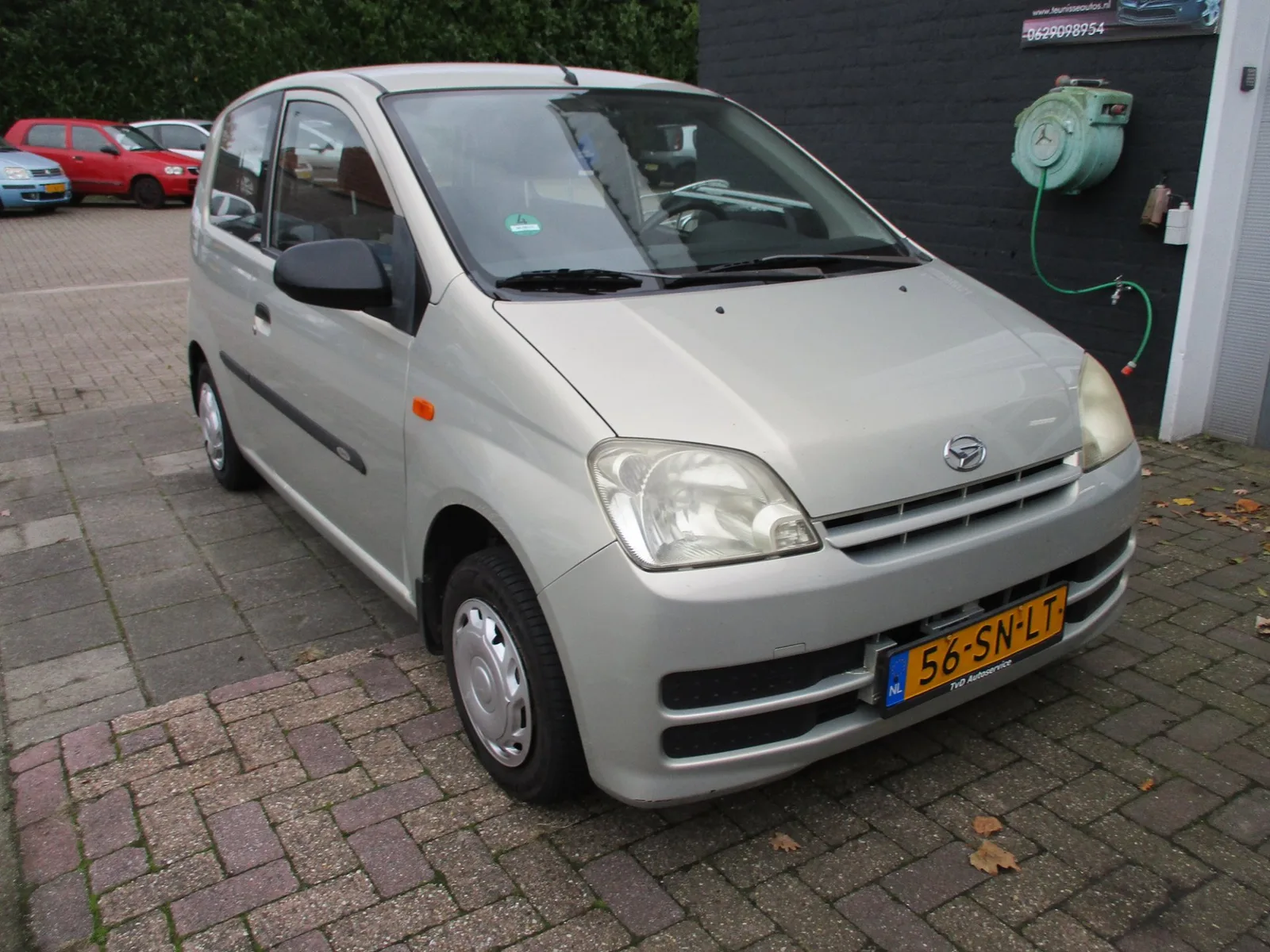 Daihatsu Cuore (2006) — foto 1