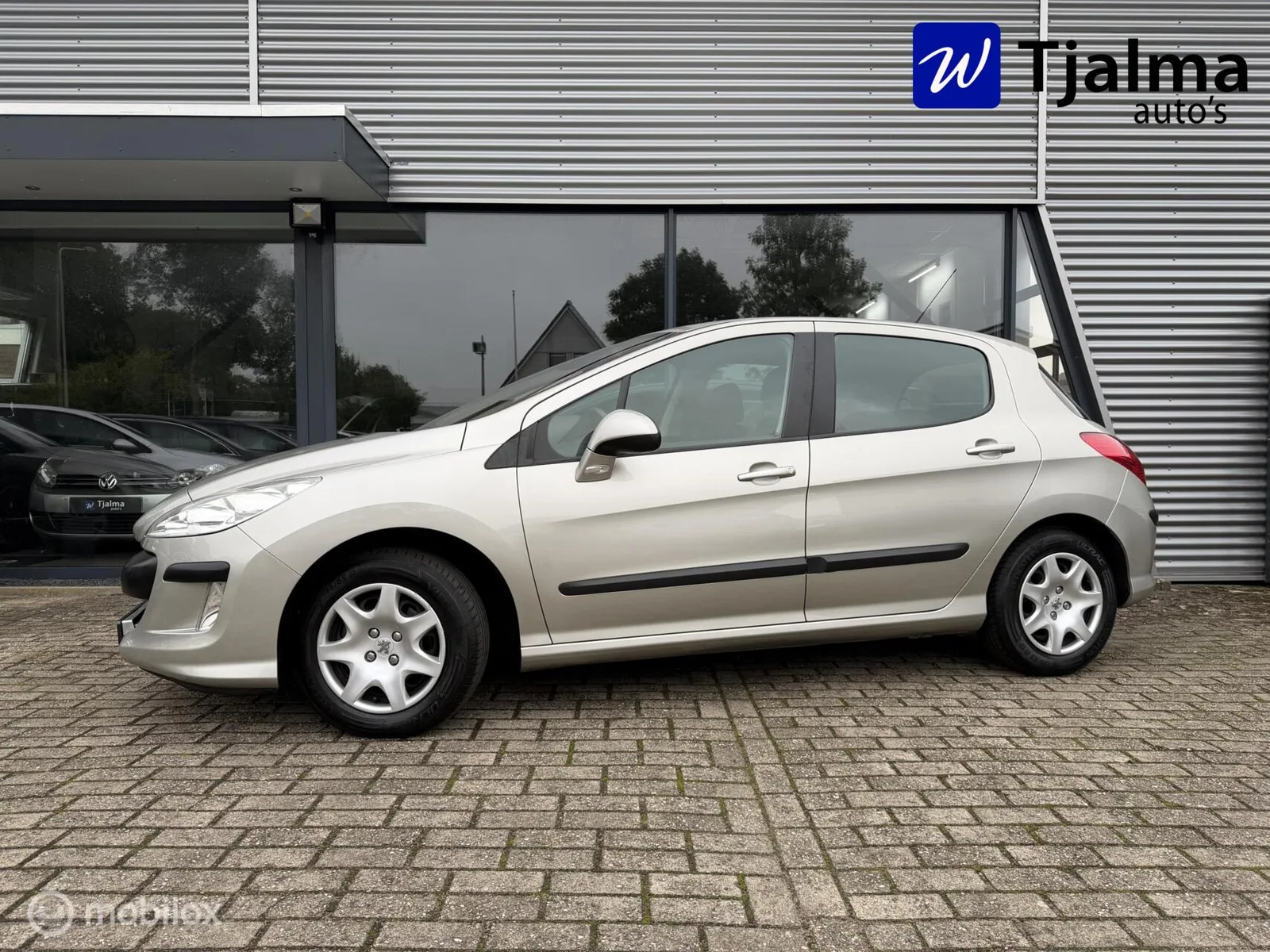 Peugeot 308 (2007) — foto 1