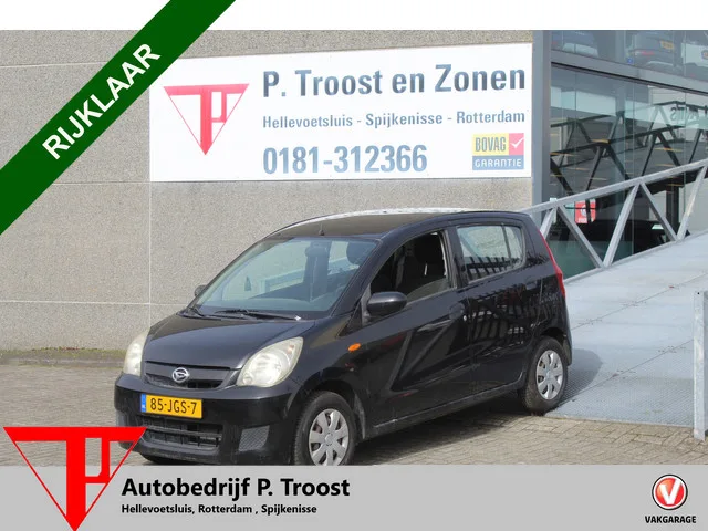 Daihatsu Cuore (2009) — foto 1