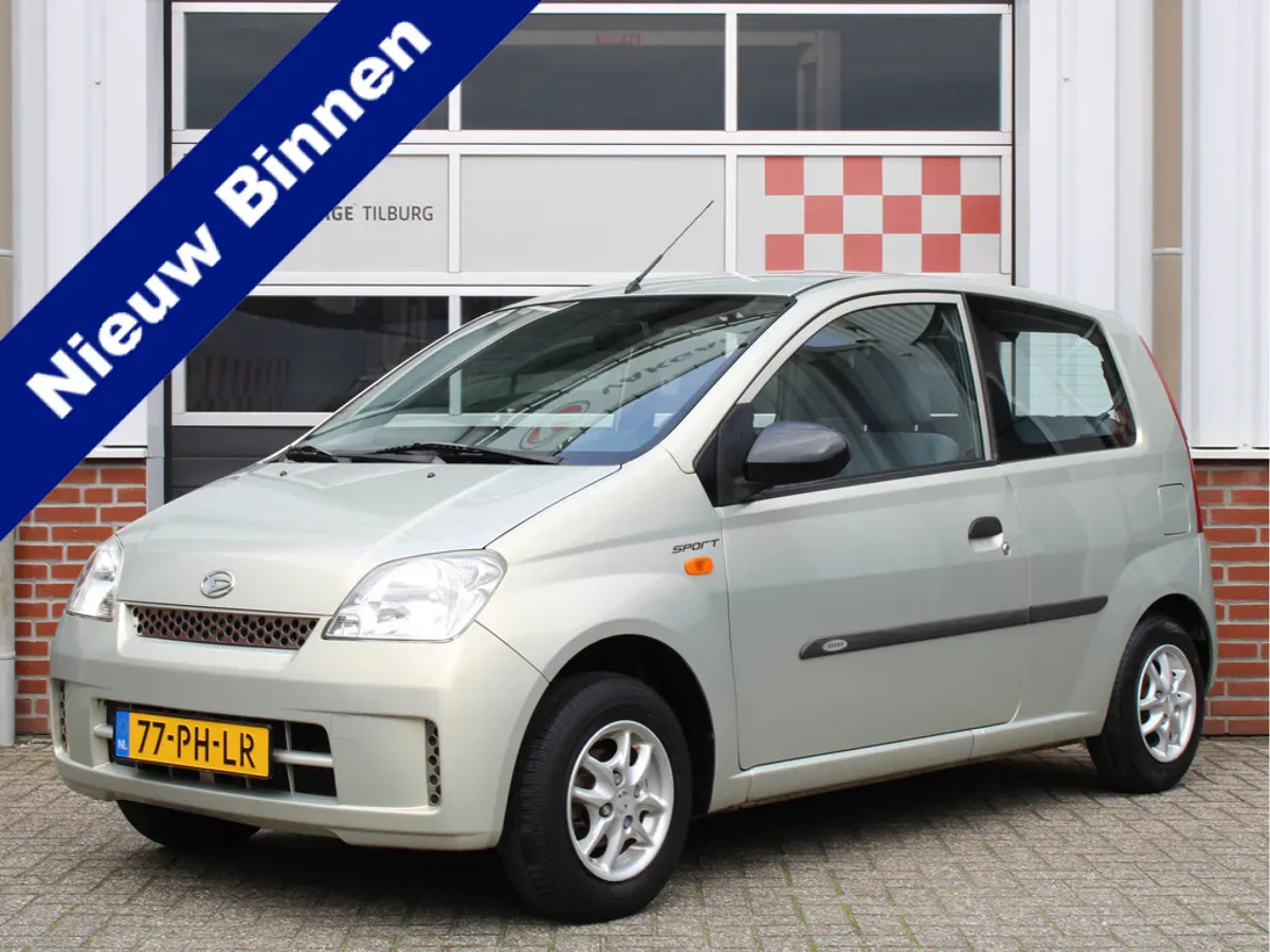 Daihatsu Cuore (2004) — foto 1