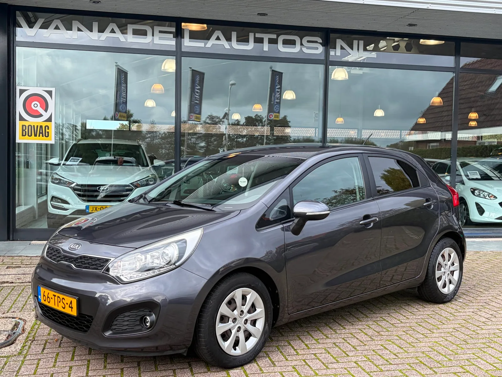 Kia Rio (2012) — foto 1
