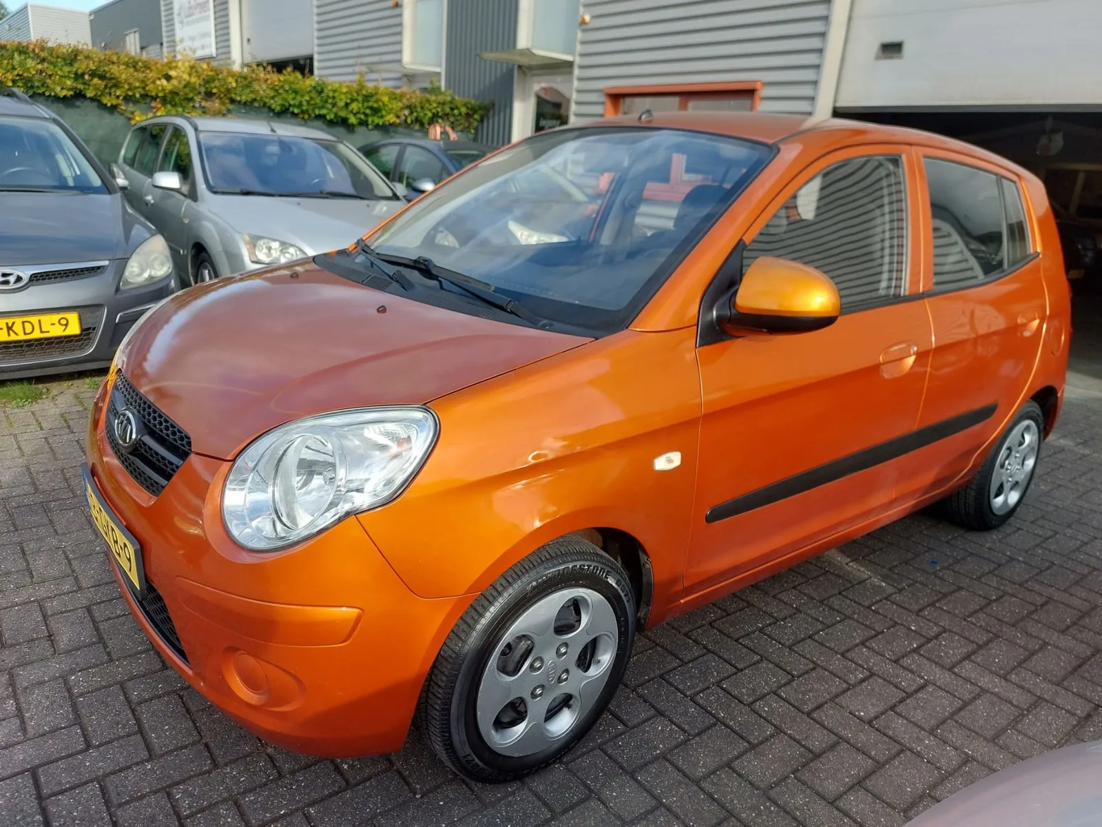 Kia Picanto (2009) — foto 1