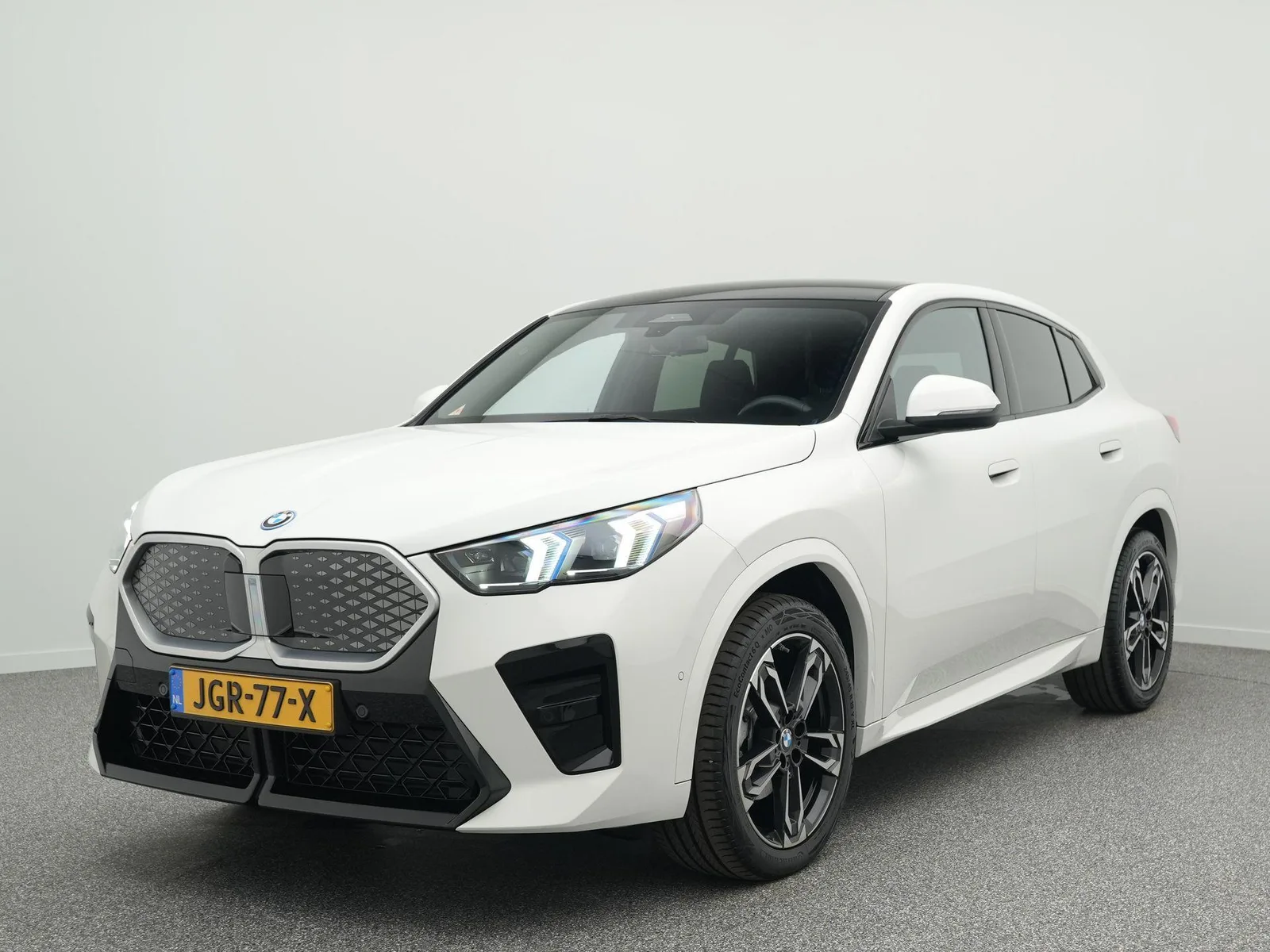 BMW iX2 (2025) — foto 1