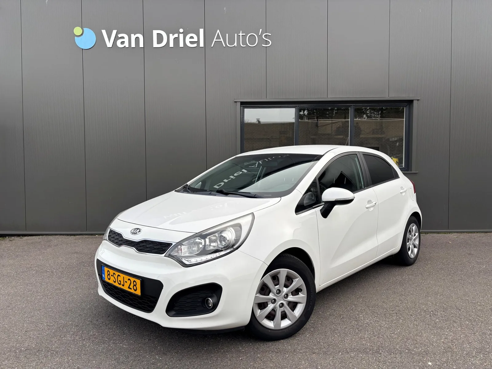 Kia Rio (2013) — foto 1