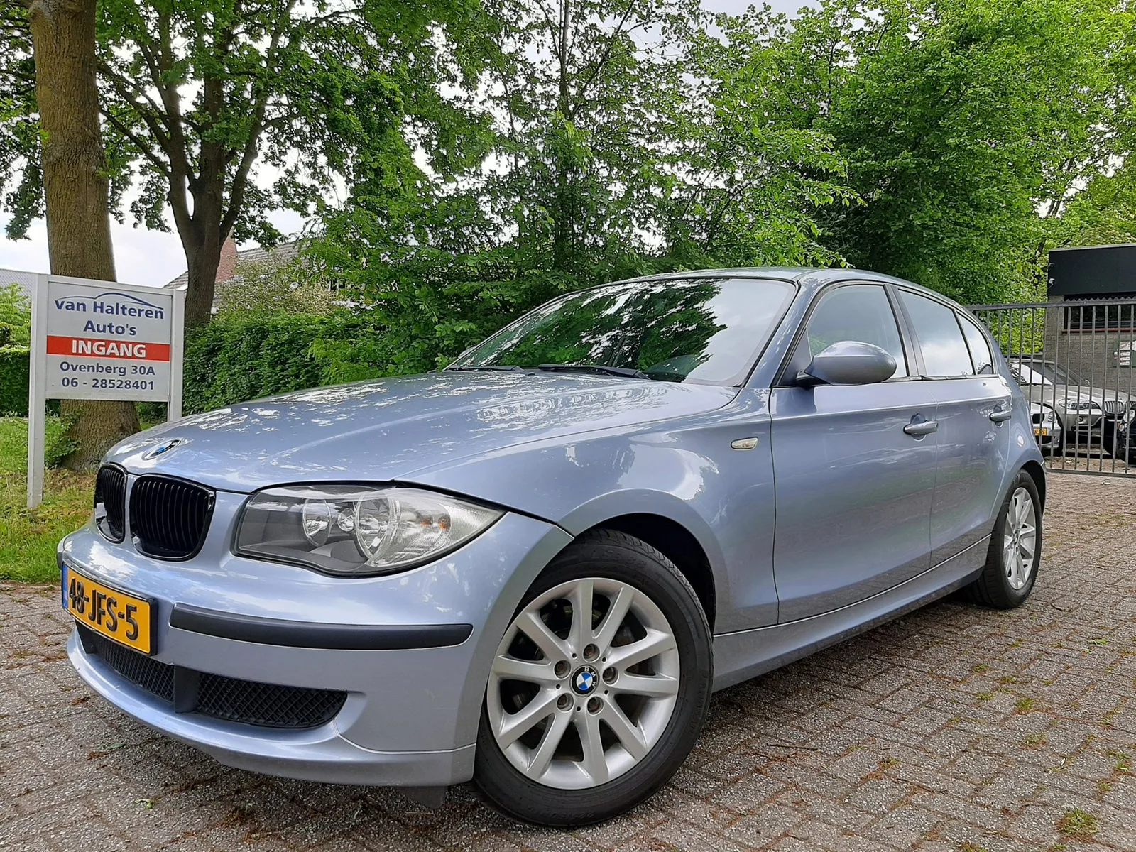 BMW 1-Serie (2009) — foto 1