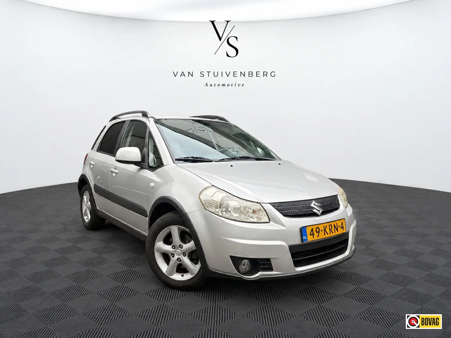 Suzuki SX4 (2010) — foto 1