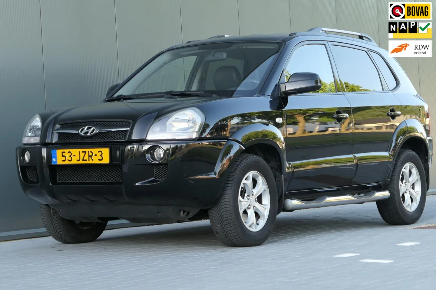 Hyundai Tucson (2009) — foto 1