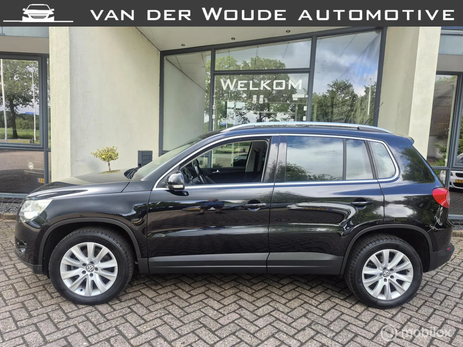 Volkswagen Tiguan (2009) — foto 1