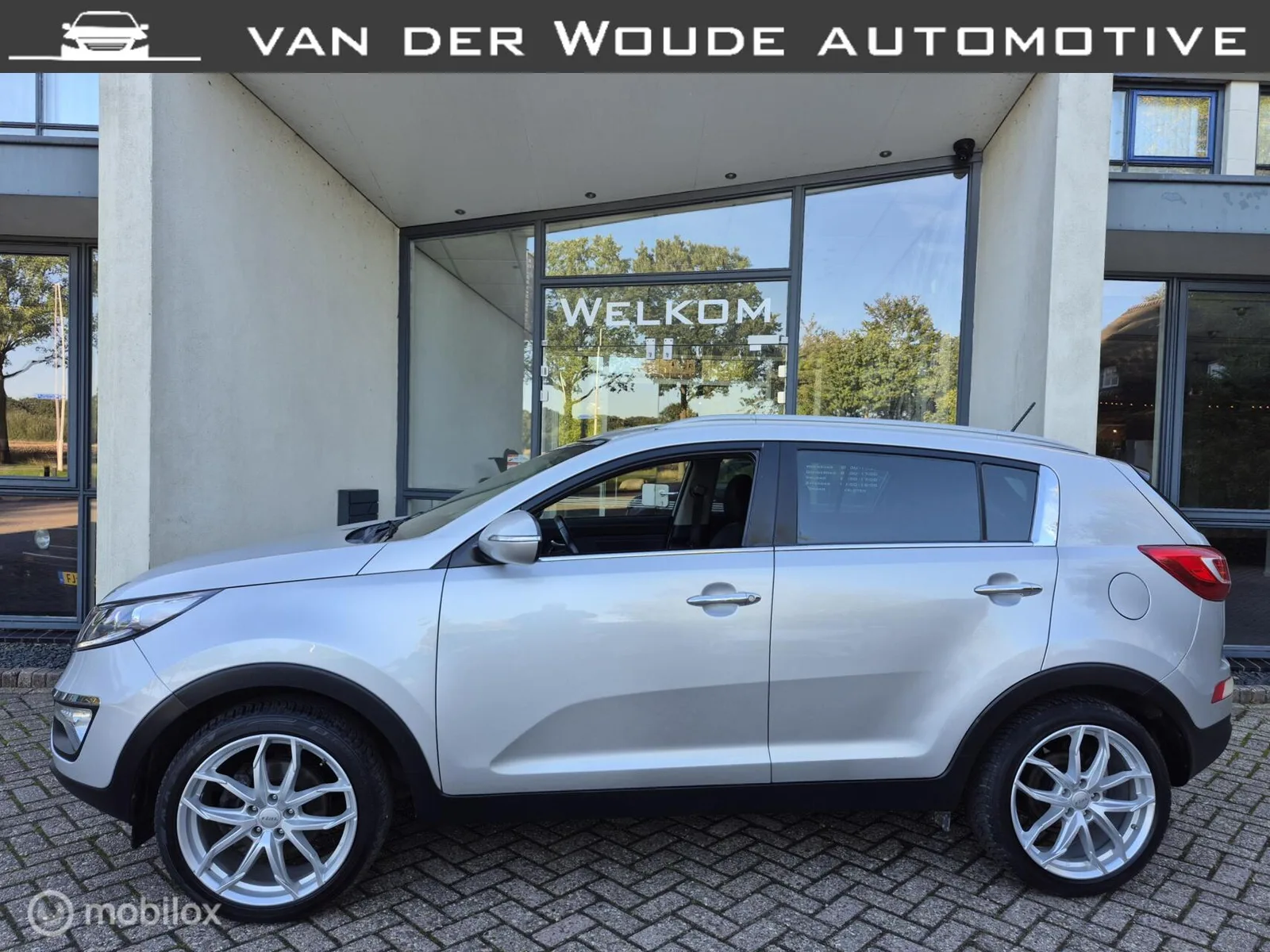 Kia Sportage (2012) — foto 1
