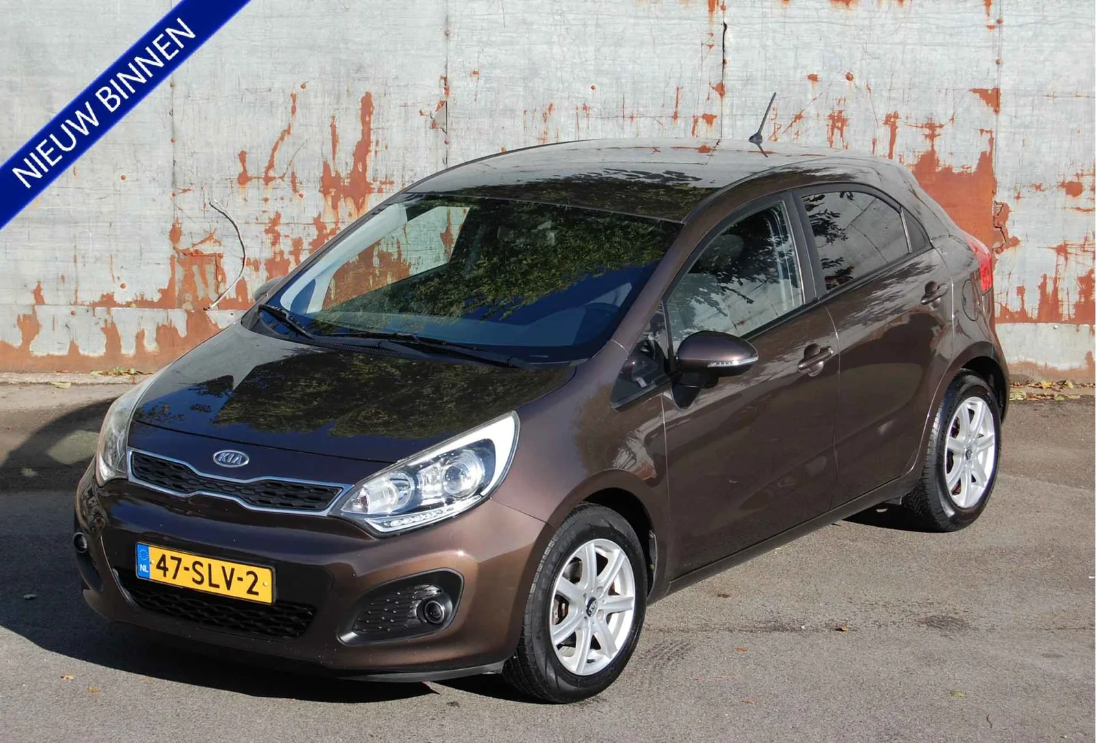 Kia Rio (2011) — foto 1