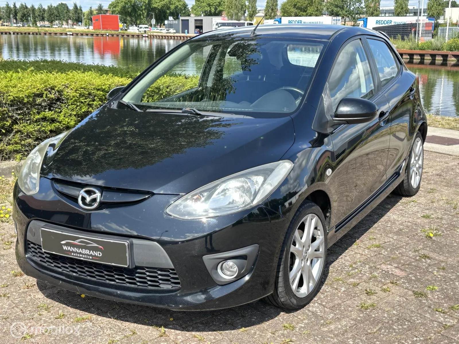 Mazda 2 (2009) — foto 1