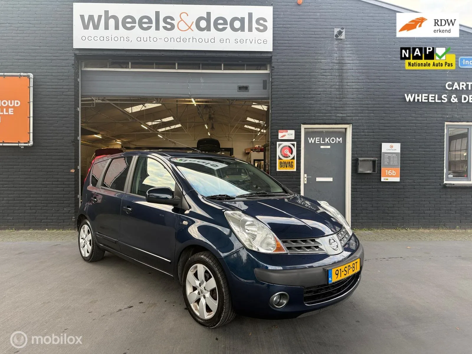 Nissan Note (2006) — foto 1
