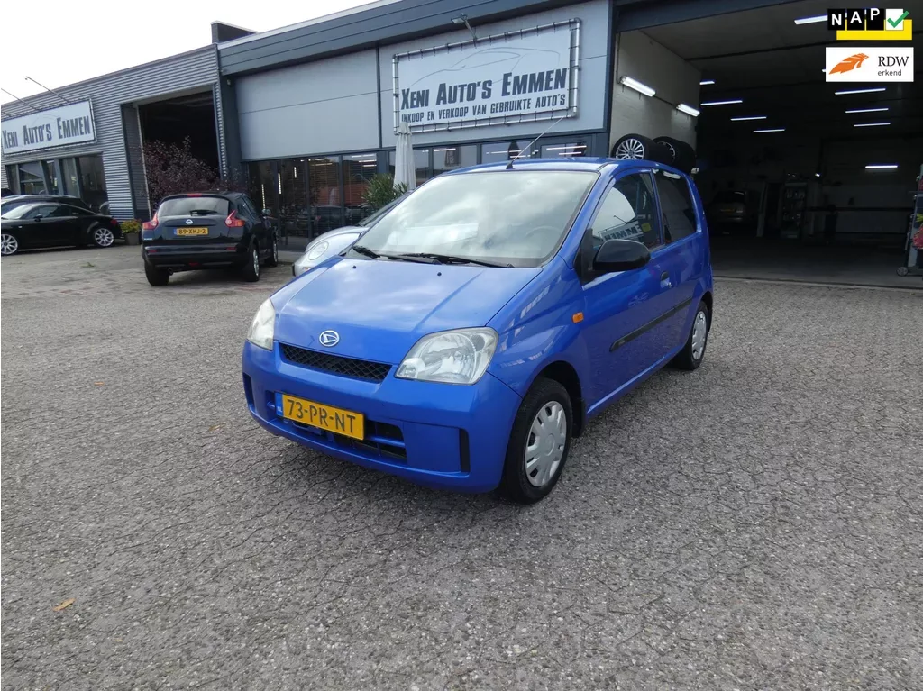 Daihatsu Cuore (2004) — foto 1