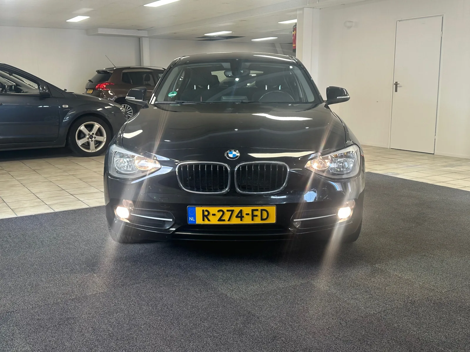 BMW 1-Serie (2012) — foto 1